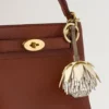 Blommig nyckelring – Pom Pom Buttermilk & Eggshell blandade material