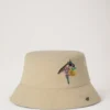 Broderad bucket hat i ecru bomull Sommarutgåva