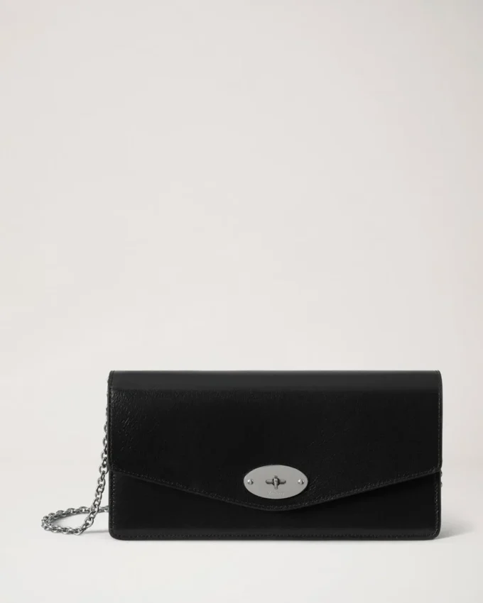 Darley Clutch Svart högblankt läder för kvinnor