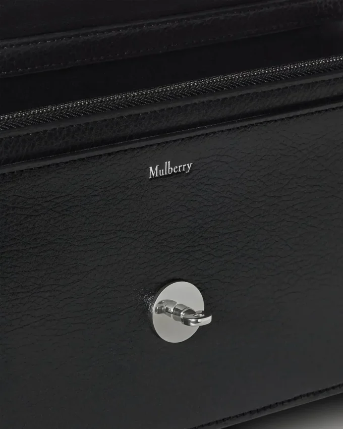 Darley Clutch Svart högblankt läder för kvinnor