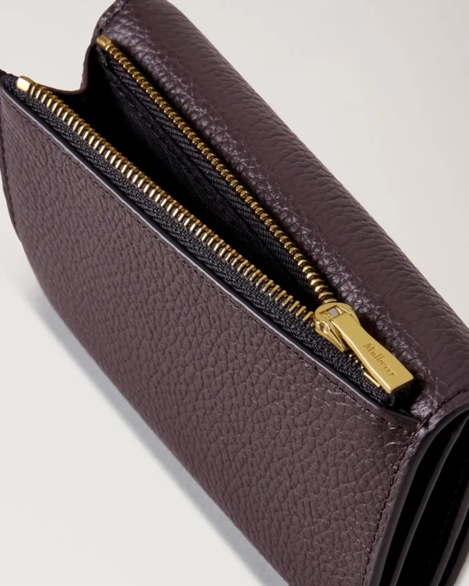 Darley vikbar plånbok med flera kortfack Ebony Small Classic Grain