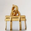 Emaljerad Bayswater-berlock i vitt och guld, blandade material Emaljerad Bayswater-berlock i vitt och guld, blandade material
