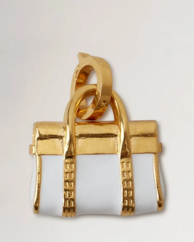 Emaljerad Bayswater-berlock i vitt och guld, blandade material Emaljerad Bayswater-berlock i vitt och guld, blandade material