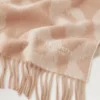 Leopardmönstrad merinoullssjal i färgerna Maple & Ecru