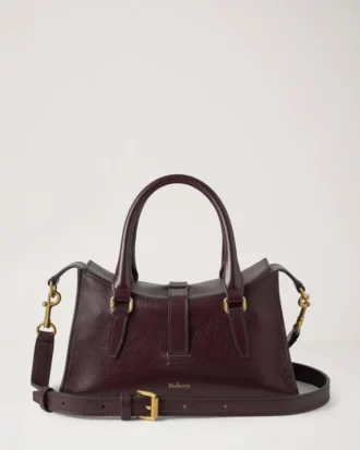 Mini Roxanne Oxblood högblankt läder – presenter till henne