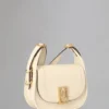 Mini Sadie Satchel Begagnad äggskalsfärgad högblank läder Mini Sadie Satchel Begagnad äggskalsfärgad högblank läder