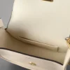 Mini Sadie Satchel Begagnad äggskalsfärgad högblank läder Mini Sadie Satchel Begagnad äggskalsfärgad högblank läder
