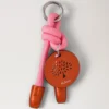 Nyckelring i rep, rosa och korallorange, blandat material