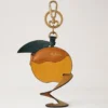 Nyckelring med skalad frukt – orange, flerfärgat blandat material Nyckelring med skalad frukt – orange, flerfärgat blandat material