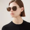 Rosie solglasögon i guld och brunt metall med linser i bio-nylon Rosie solglasögon i guld och brunt metall med linser i bio-nylon