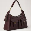Roxanne axelväska Oxblood högblankt läder