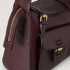 Roxanne axelväska Oxblood högblankt läder