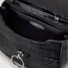 Small Amberley with handle, black glossy, small crocodile patterns Small Amberley with handle, black glossy, small crocodile patterns