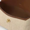 Stor Darley-kosmetisk väska i ecru och ljus ek med raffia och läderkant Stor Darley-kosmetisk väska i ecru och ljus ek med raffia och läderkant
