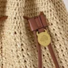Virkad hinkväska i naturfärgad virkad raffia – sommarutgåva Virkad hinkväska i naturfärgad virkad raffia – sommarutgåva